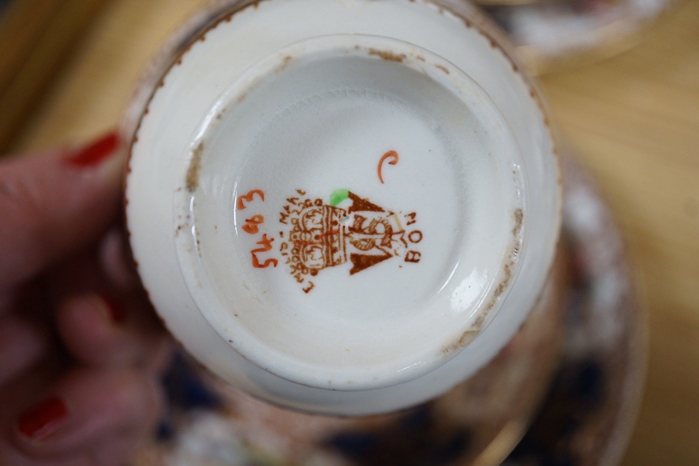 A Crown Staffordshire tea service decorated in white and gilt (46 pieces)